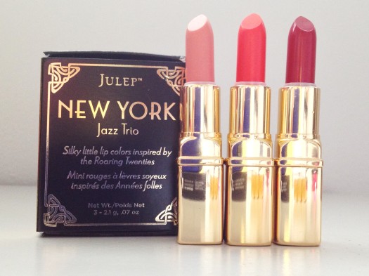 Julep's New York Jazz Lip Trio in Tea for Two (nude shimmer lip sheer), Satin Doll (poppy lip sheer), and  Lady in Red (matte crimson lip color)