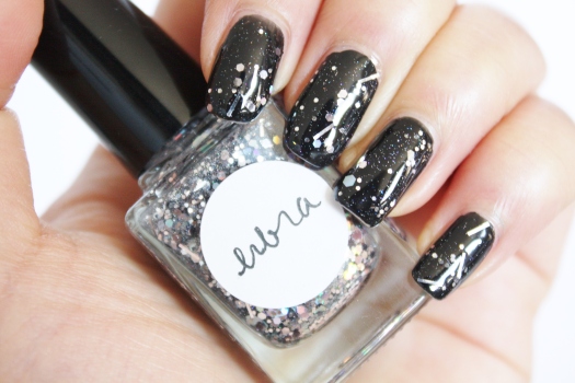 Libra is a beautiful blend of multi-sized holographic silver, gunmetal, and silver bar glitter in a clear base
