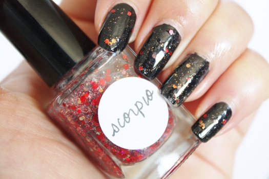 Scorpio is a beautiful blend of multi-sized cherry red, holographic red, and iridescent glitter in a clear base