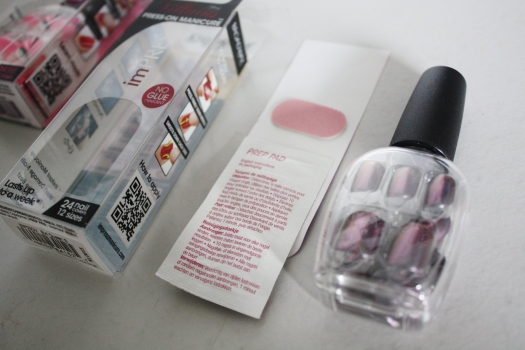 Each box includes a nail polish bottle shaped container, a prep pad, and mini file.